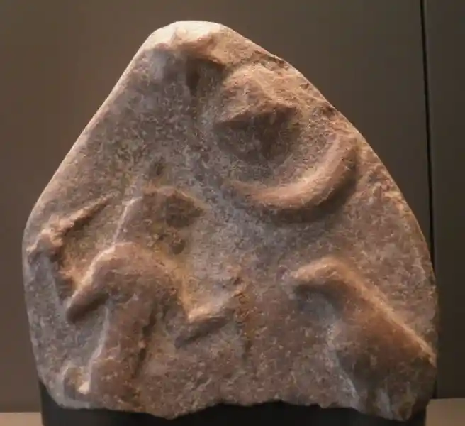 Solar cross on top of a crescent